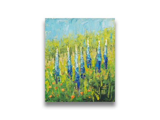 An impasto painting of blue lupine flowers in a green field, complimented by small orange flowers. Printed on canvas.