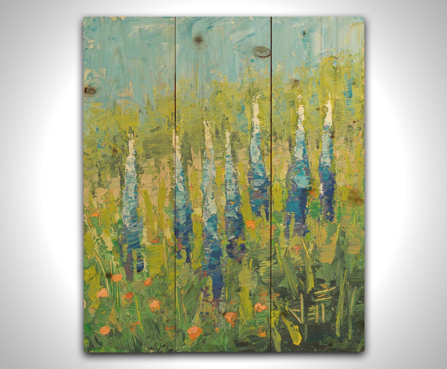 An impasto painting of blue lupine flowers in a green field, complimented by small orange flowers. Printed on a wood pallet.