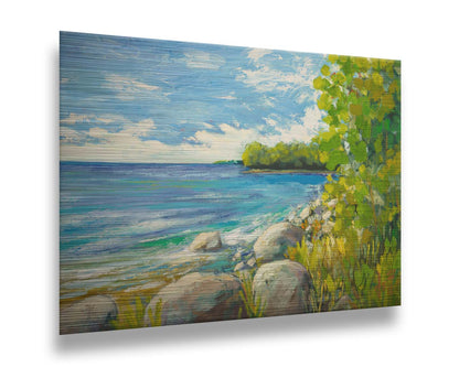 A painting of a calm bayside view. Bright green trees and foliage line the shore alongside smooth gray stones, and a blue sky with fluffy clouds reflects off smooth waters. Printed on metal.