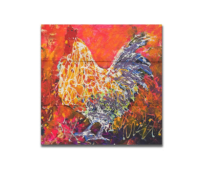 A drip painting of a rooster against a textured red, orange, pink, and purple background. Using the same palette, with the addition of white, a rooster's silhouette is formed with paint drizzled onto the substrate. Printed on a box board.