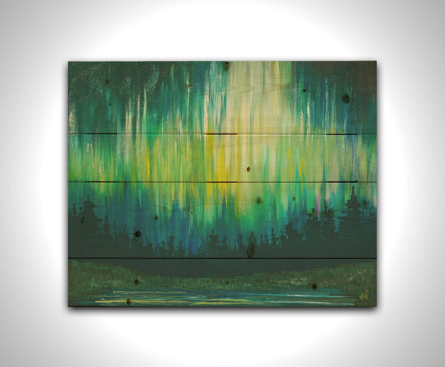 A painting of a colorful aurora in yellow, green, and blue in the sky above an evergreen forest, which surrounds a body of water reflecting the aurora. Printed on a wood pallet.