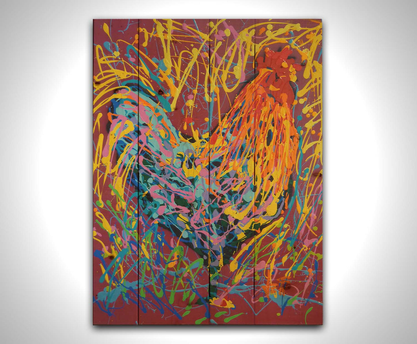 A drip painting of a rooster in orange and blue, accented with a full spectrum of other bright colors. Dynamic patterns of paint drips surround the rooster against a red background. Printed on a wood pallet.