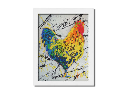 A drip painting of a rooster in red, orange, yellow, green, and blue set against a white background speckled with black and yellow. Printed on canvas and framed.