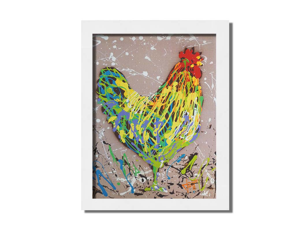 A drip painting of a rooster in yellow, green, blue, and orange set against a tan background speckled with white and black. Printed on canvas and framed.