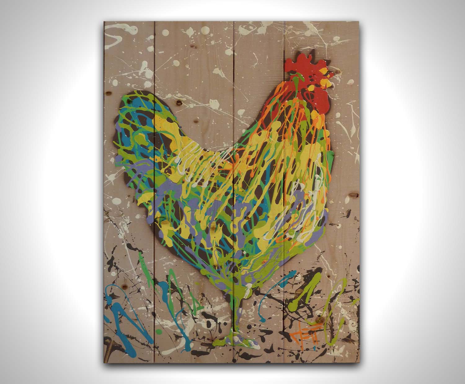 A drip painting of a rooster in yellow, green, blue, and orange set against a tan background speckled with white and black. Printed on a wooden pallet.