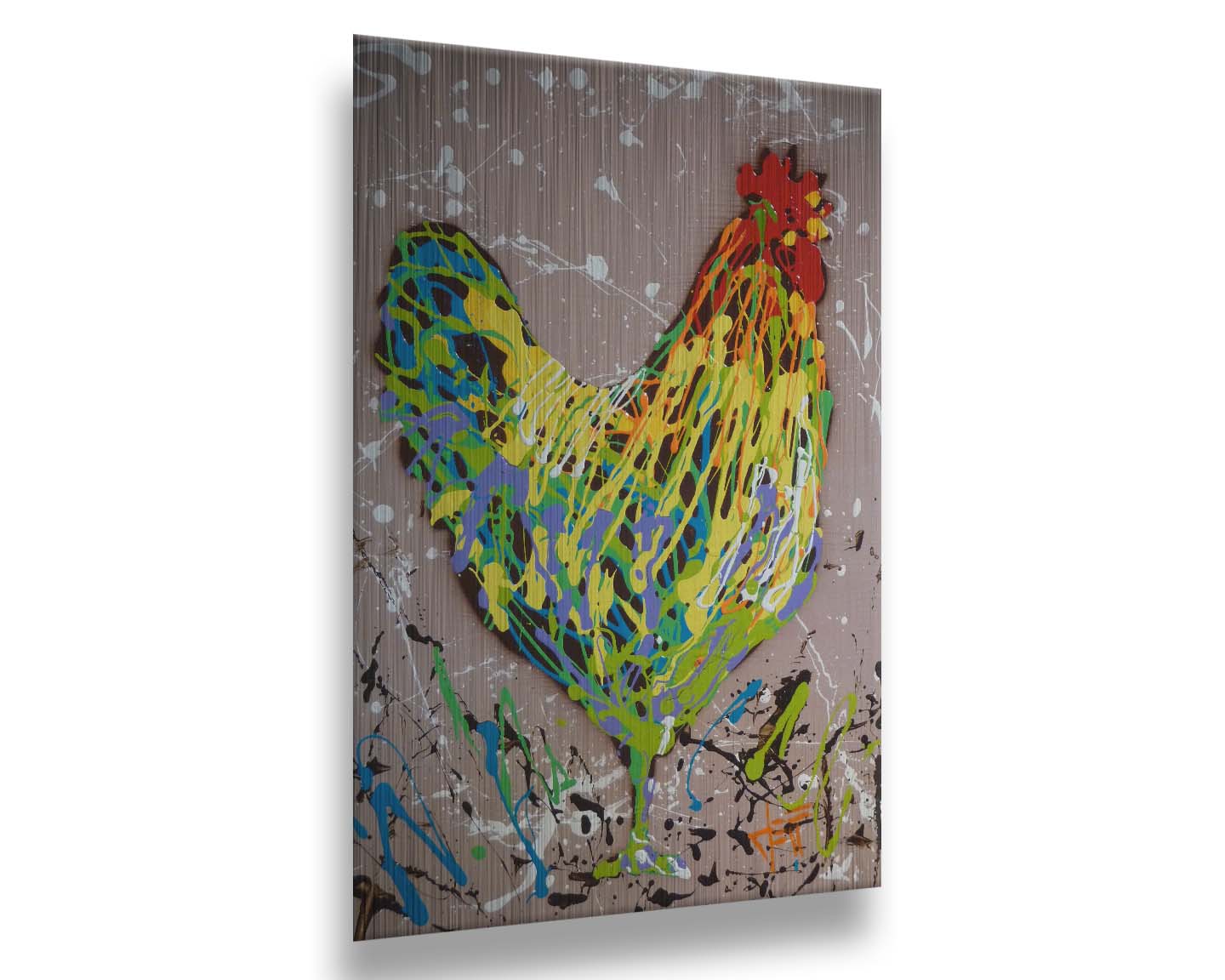 A drip painting of a rooster in yellow, green, blue, and orange set against a tan background speckled with white and black. Printed on metal.