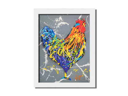 A drip painting of a rooster in a rainbow of colors, against a sleek gray backdrop, accented by white splashes. Printed on canvas and framed.