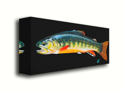 A painting of a colorful brook trout– in green, yellow, and orange– against a bold black background. Printed on canvas.