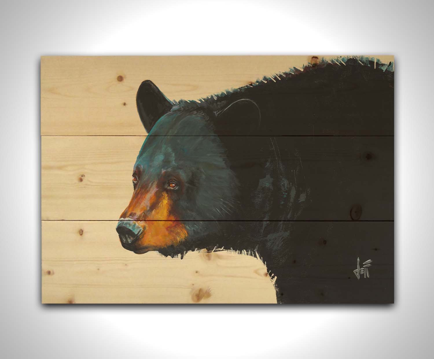 A painting of a black bear against an eggshell background. This portrait is in a 3/4s profile, with light highlighting the shapes and textures of the bear's face and fur with shimmering blue. Printed on a wood pallet.