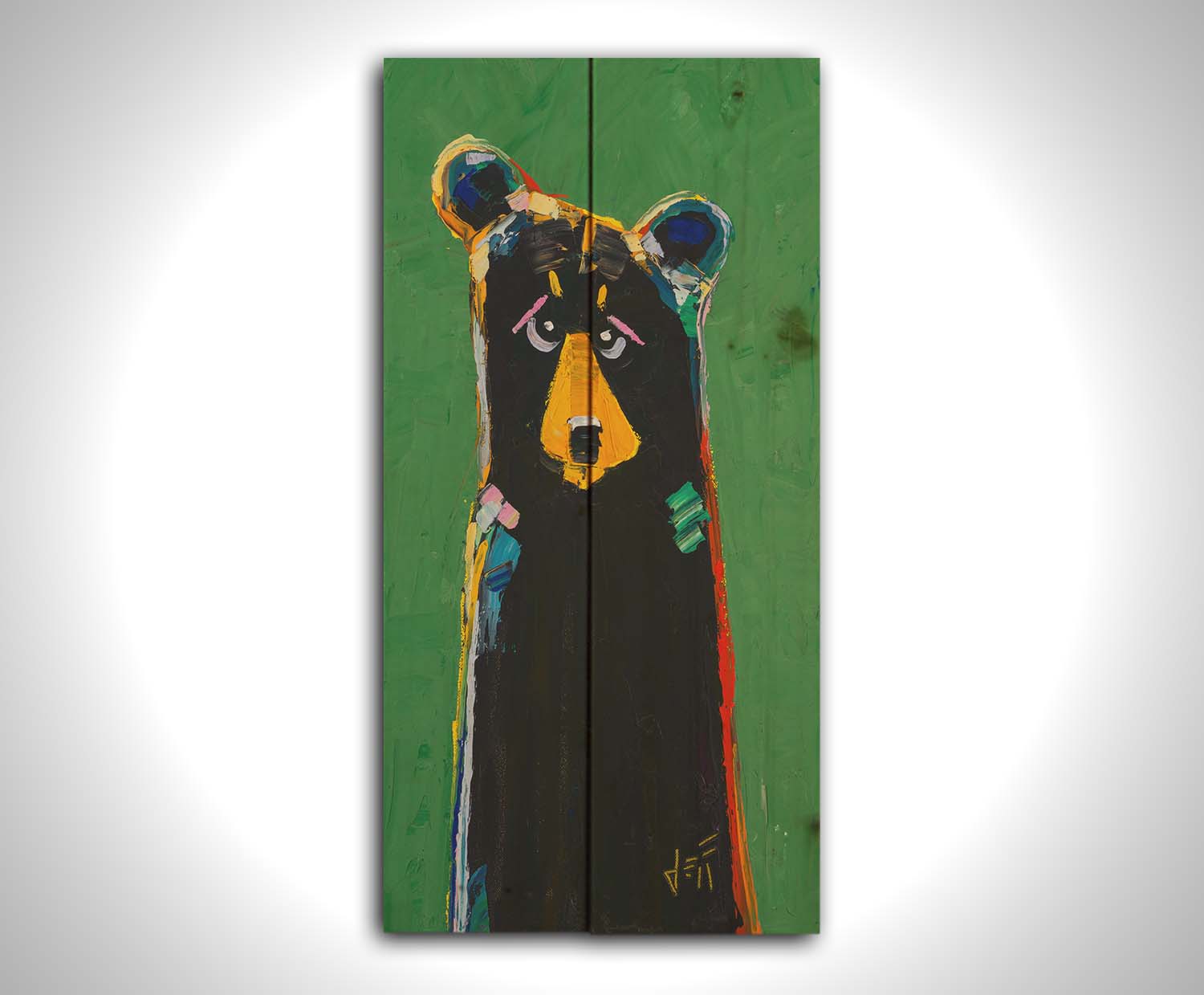 A stylized portrait painting of a black bear depicted as a simplified shape, accented by a spectrum of colorful outlines, and set against a bright green background. Printed on a wood pallet.