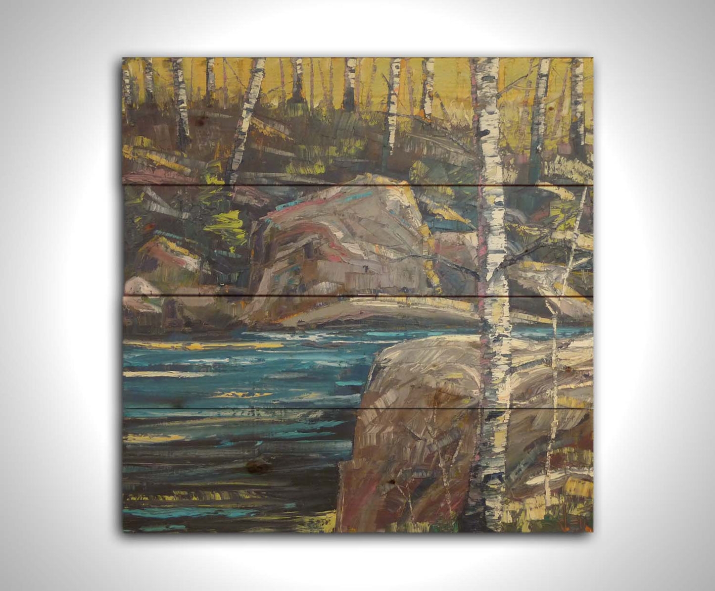 A painting of the stone bank of a river, running through a birch forest. Printed on a wood pallet.