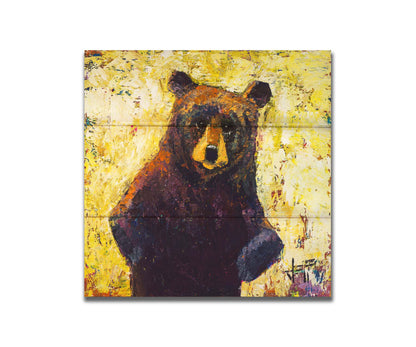 A highly textured, stylized portrait of a brown bear against a yellow background. Printed on a box board.