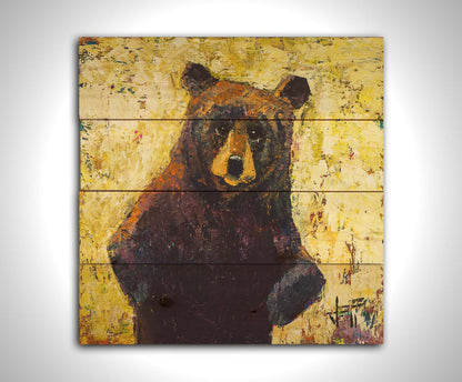 A highly textured, stylized portrait of a brown bear against a yellow background. Printed on a wood pallet.