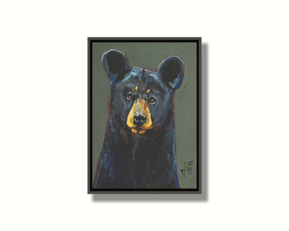 A painting of a black bear, accented with reds and blues, set against a gray-green background. Printed on canvas in a float frame.