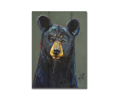 A painting of a black bear, accented with reds and blues, set against a gray-green background. Printed on a box board.