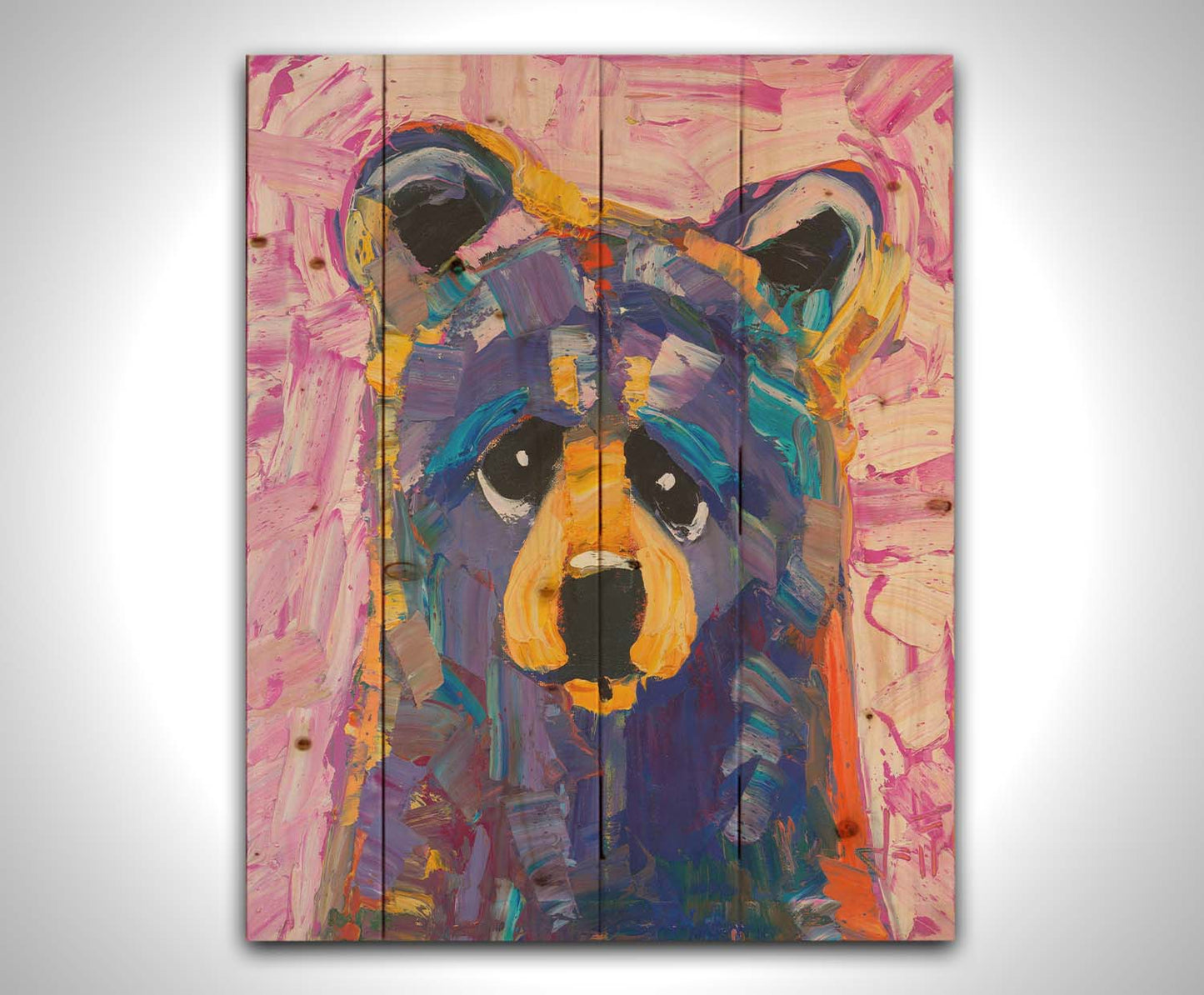 An impasto painting of a simplified, stylized bear in purples and pinks, accented with yellows in large, energetic brushstrokes. Printed on a wood pallet.