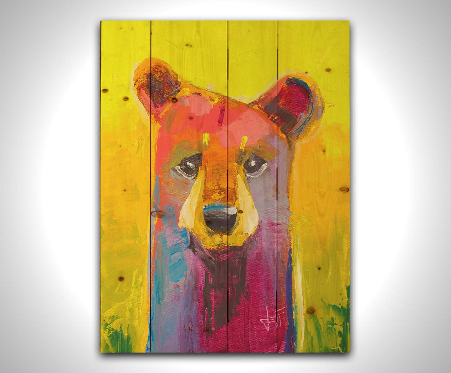 A painting of a simplified, stylized bear in vibrant pink and purple hues against a bold yellow backdrop. Printed on a wood pallet.