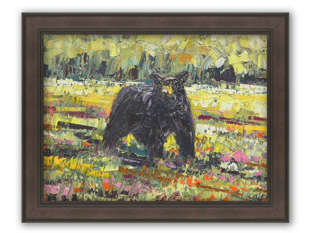 An impasto painting of a black bear wandering through a vibrant field, surrounded by a forest. It is created with an impasto technique using rectangular brushstrokes. Printed on canvas and framed.