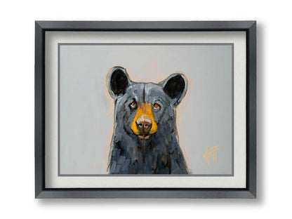 A portrait painting of a front-facing portrait of a stately black bear against a pale gray backdrop. Printed on paper, matted, and framed.