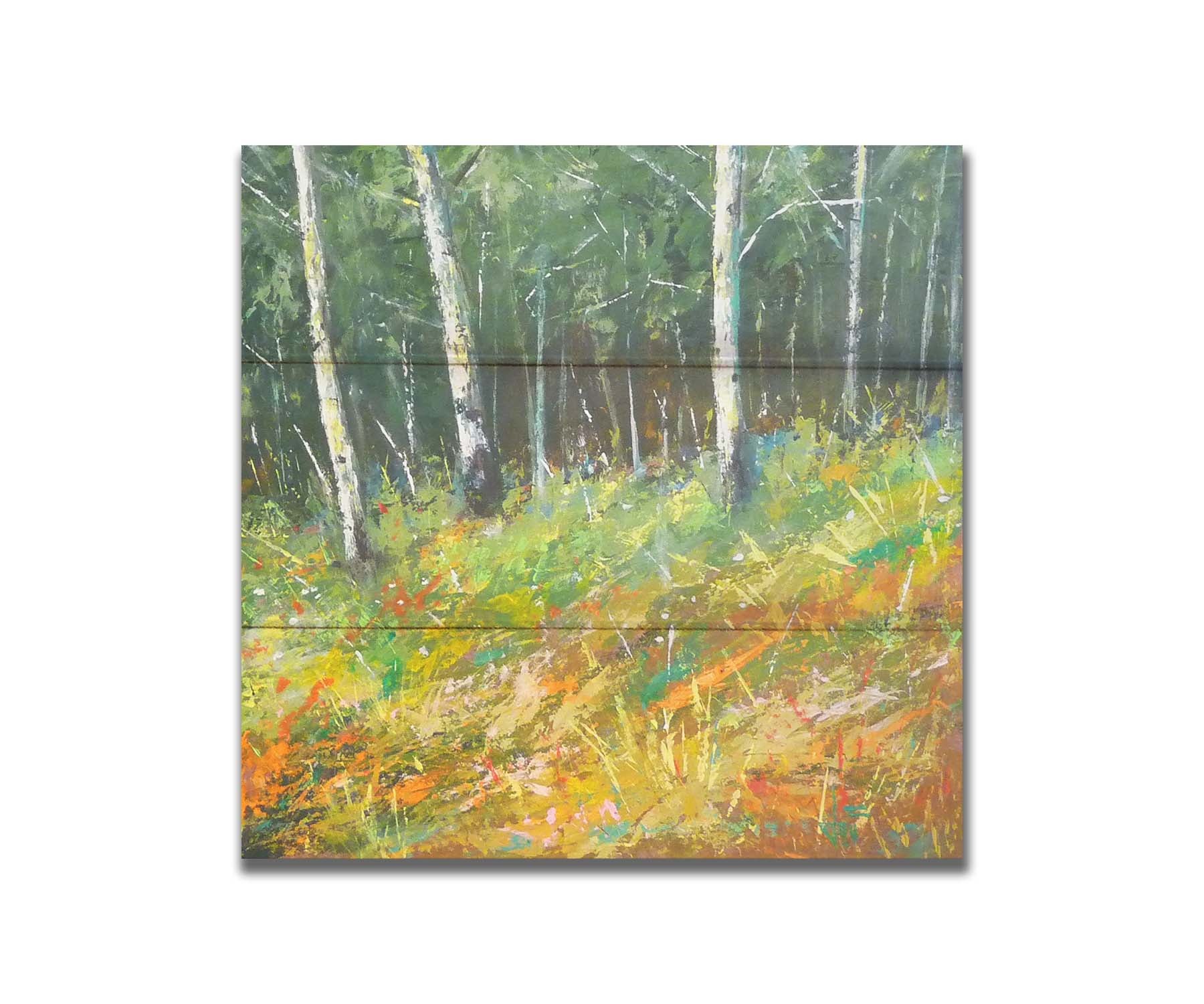 A painting of a hillside forest with colorful grasses in yellows, oranges, and greens. Printed on a box board.