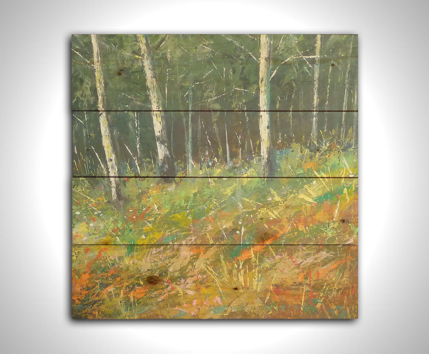 A painting of a hillside forest with colorful grasses in yellows, oranges, and greens. Printed on a wood pallet.