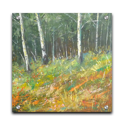 A painting of a hillside forest with colorful grasses in yellows, oranges, and greens. Printed on acrylic.