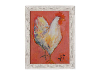 A painting of a white rooster with a bright red comb, accented with warm tones and set against a paler red background. Printed on canvas and framed.