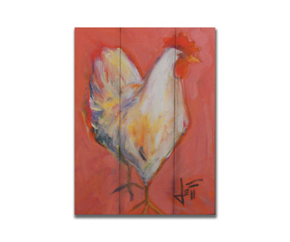 A painting of a white rooster with a bright red comb, accented with warm tones and set against a paler red background. Printed on a box board.