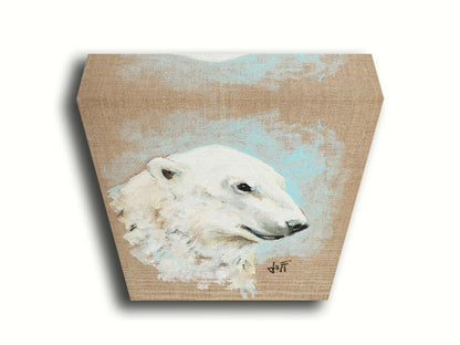 A portrait of a polar bear's head, backed with an ice blue accented, beige canvas background. Printed on canvas.