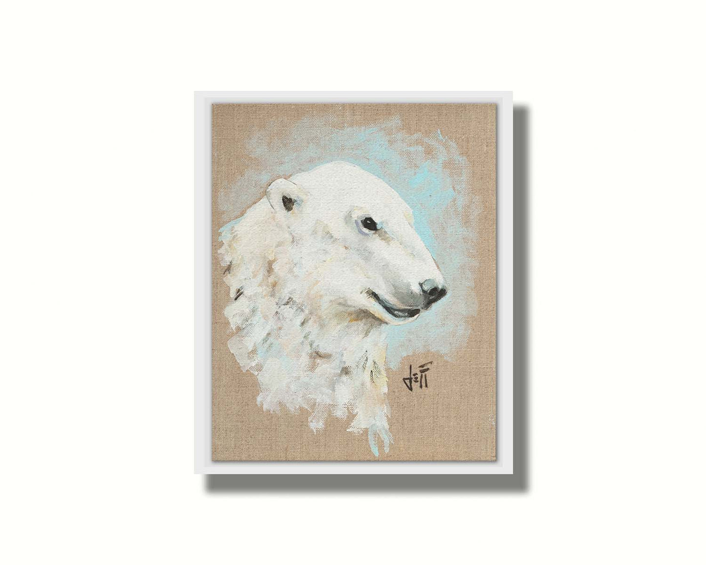 A portrait of a polar bear's head, backed with an ice blue accented, beige canvas background.Printed on canvas in a float frame.