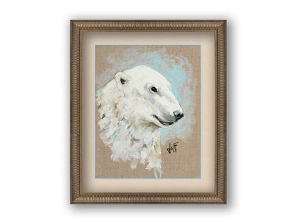 A portrait of a polar bear's head, backed with an ice blue accented, beige canvas background. Printed on paper, matted, and framed.