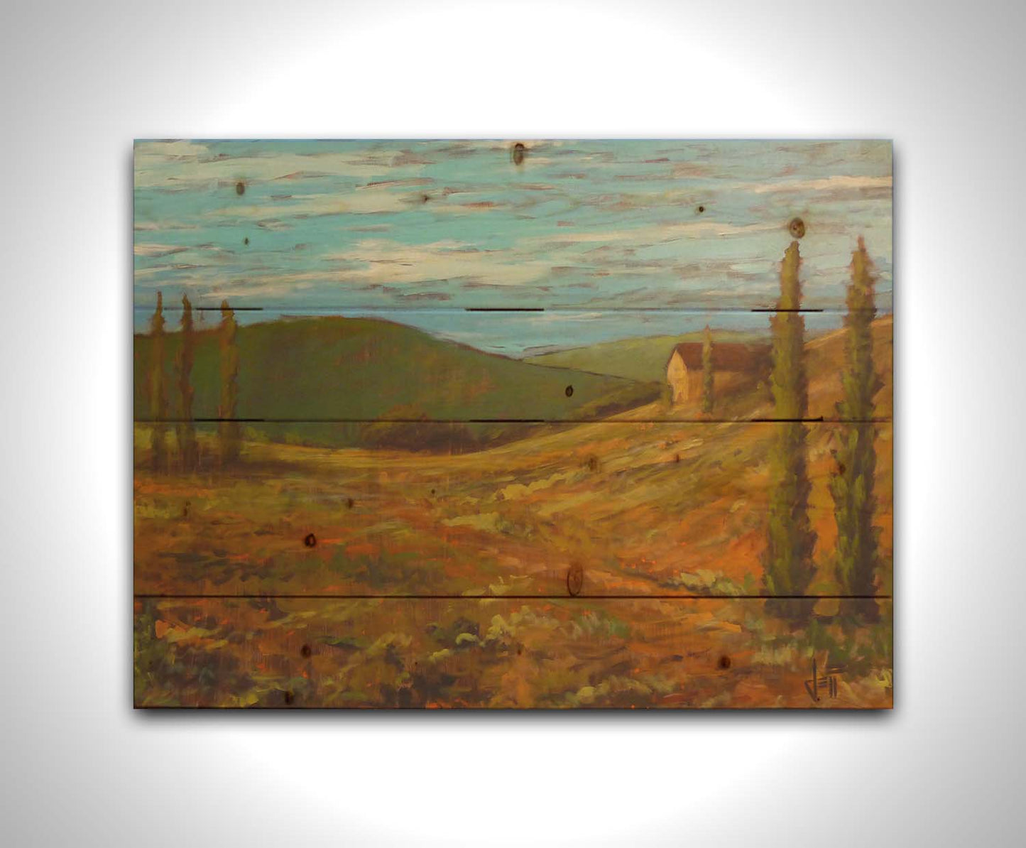 A landscape painting of Tuscany, Italy, in warm green and orange tones. The rolling hills and iconic cypress trees of Italy are set against a cool blue sky. Printed on a wood pallet.