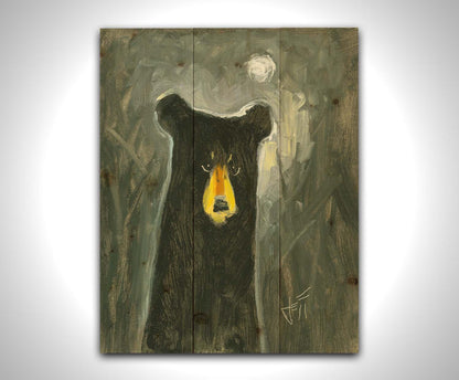 A stylized, simplified painting of a black bear, illuminated by the faint glow of the sky under the moonlight. Printed on a wood pallet.