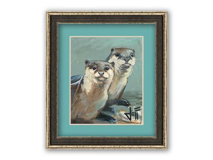 A painting of two otters sitting on the shore, their smooth fur and cool reflections brought to life in subtle natural colors. Printed on paper, matted, and framed.