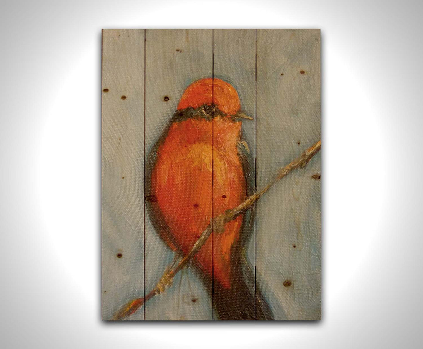 A portrait painting of a vermilion flycatcher perched on a twig against a serene gray and blue background. Printed on a wood pallet.