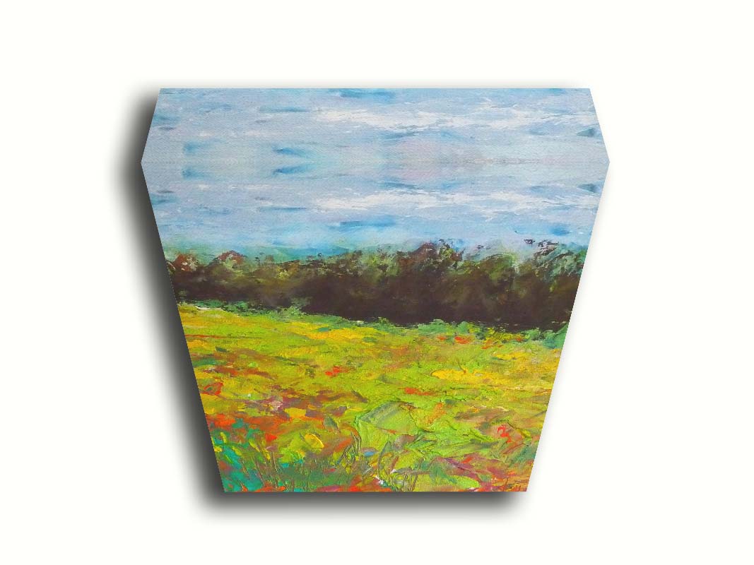 A landscape painting of a colorful meadow bordered by a lush forest, created using vibrant green impasto with pops of orange, pink, yellow, and blue. Printed on canvas.