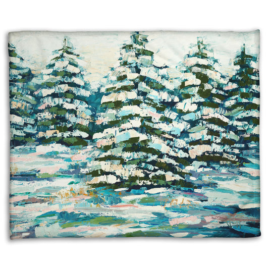 A coral fleece blanket decorated with the print of a painting of a snowy evergreen forest, textured with thick layers of paint. 