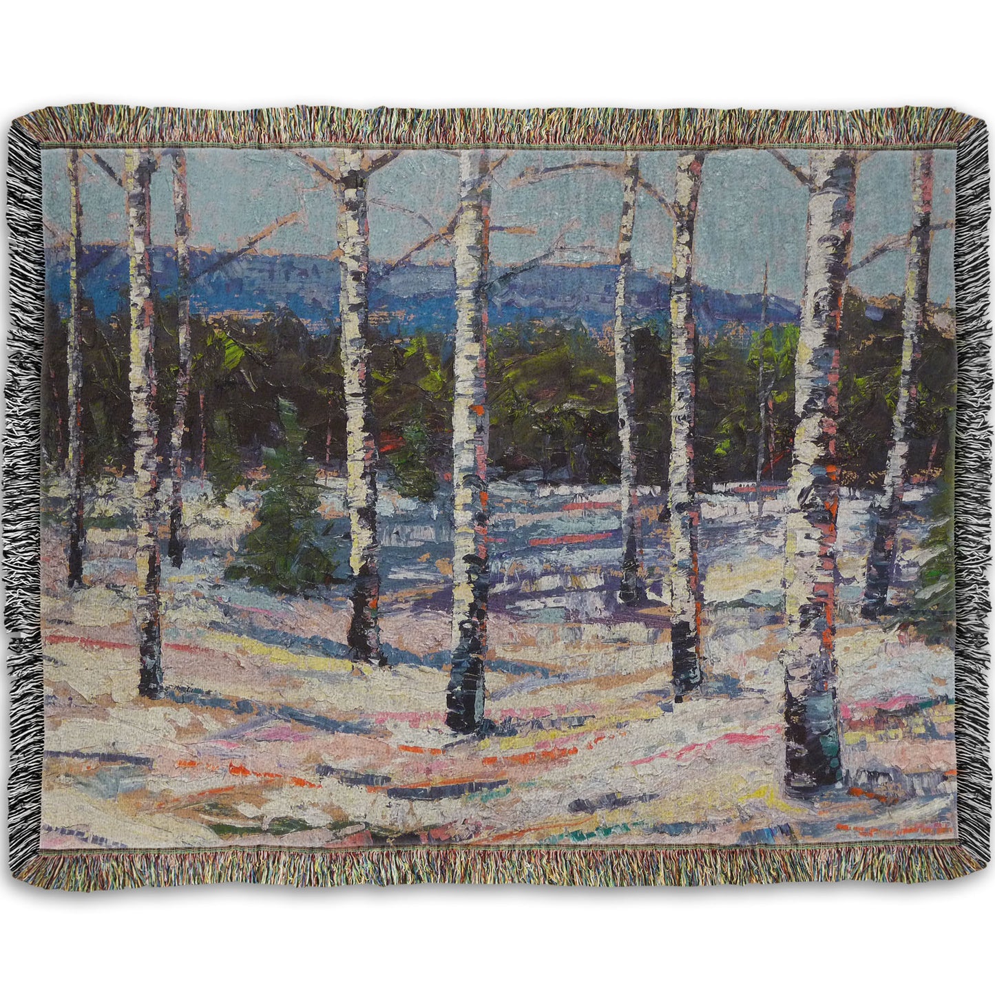 Woven throw blanket printed with a painting of birch trees in a snowy landscape with mountains in the background.