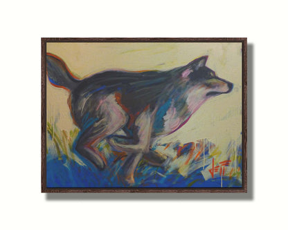 A painting of a running wolf created with dynamic brushstrokes and eye-catching colors, with reds and blues highlighting the edges. Printed on canvas in a float frame.