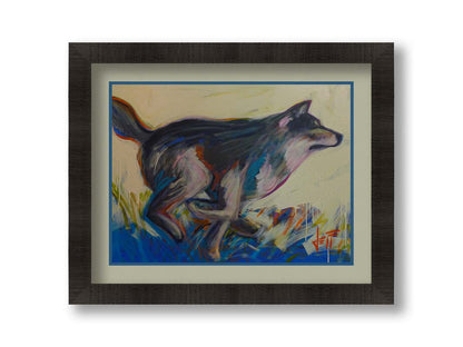 A painting of a running wolf created with dynamic brushstrokes and eye-catching colors, with reds and blues highlighting the edges. Printed on paper, matted, and framed.