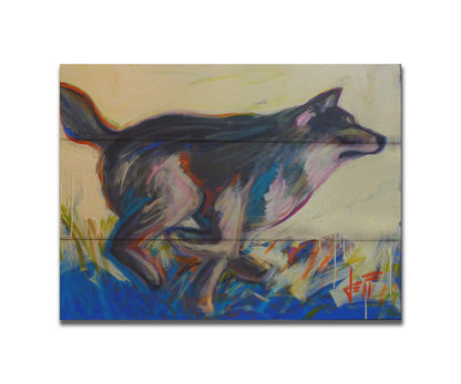 A painting of a running wolf created with dynamic brushstrokes and eye-catching colors, with reds and blues highlighting the edges. Printed on a box board.