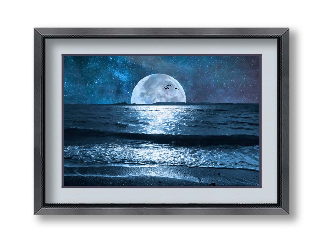 A full moon over the horizon of a calm, dark sea during a starry night. Printed on paper, matted, and framed.