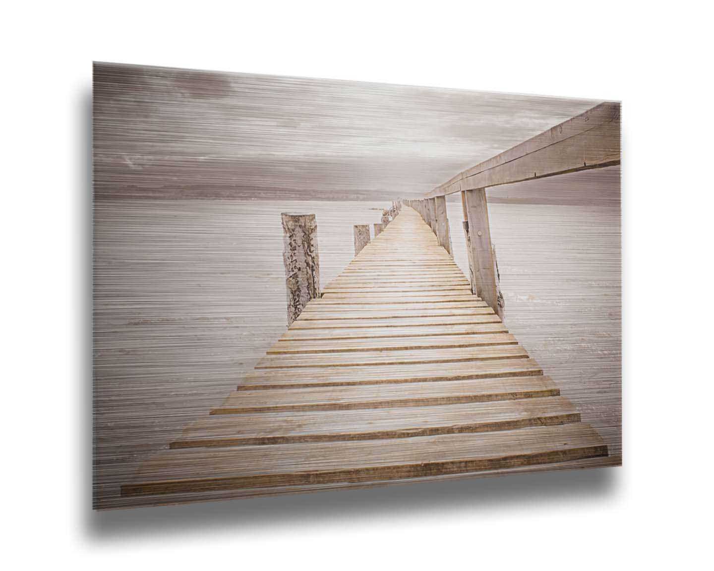 A photo looking along a pier out into the water, edited in a sepia tone. Printed on metal.