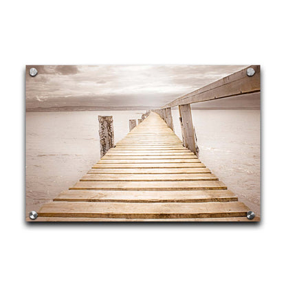 A photo looking along a pier out into the water, edited in a sepia tone. Printed on acrylic.