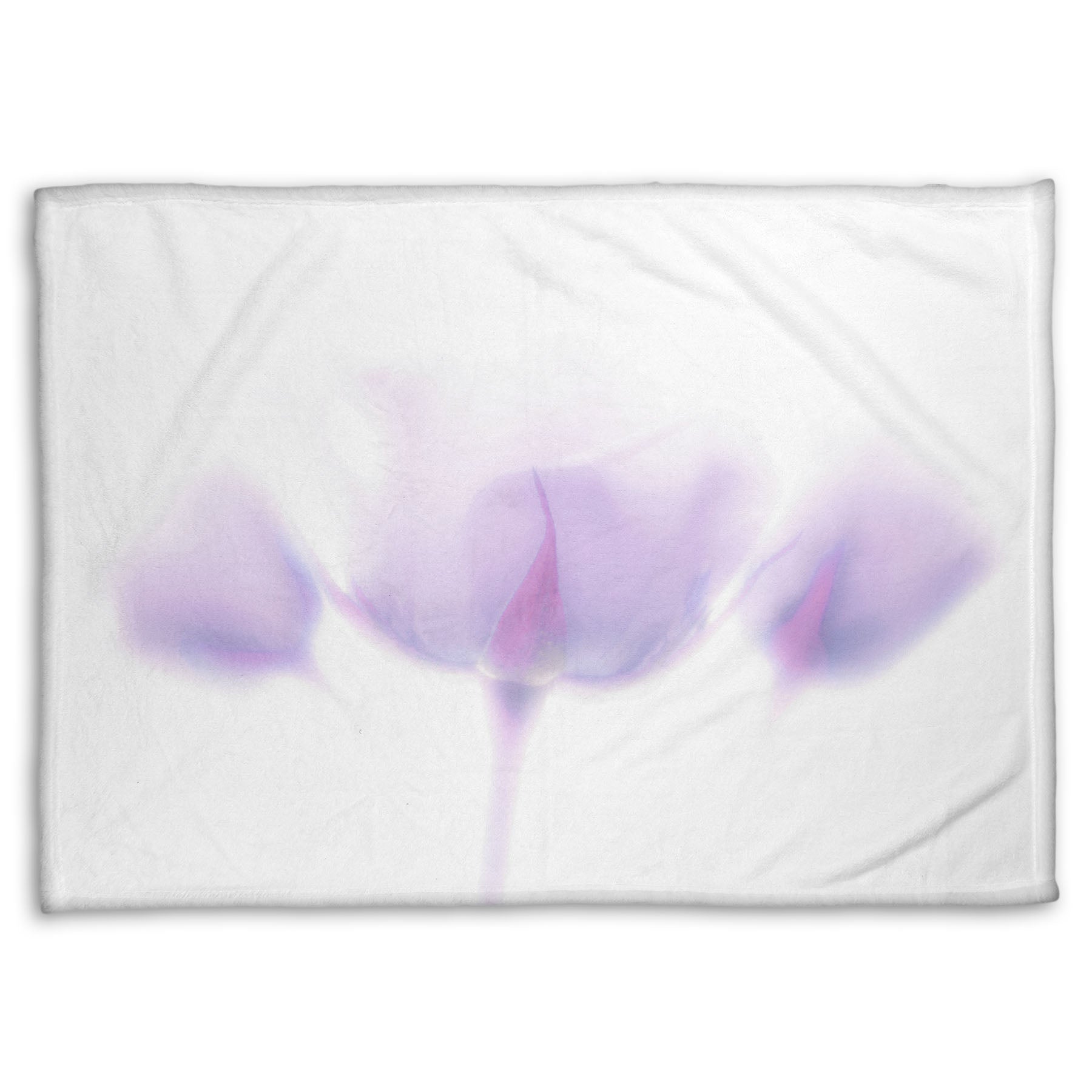 A fleece throw blanket designed with a  photo of three pale purple roses against a pure white background, enveloped in a gentle white glow.