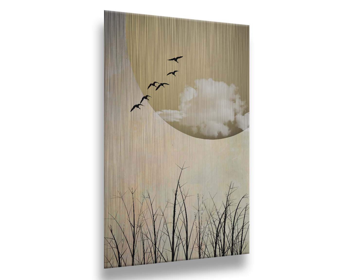 A photo collage art piece of migratory birds flying south for the winter, silhouetted against a big gold moon. Printed on metal.