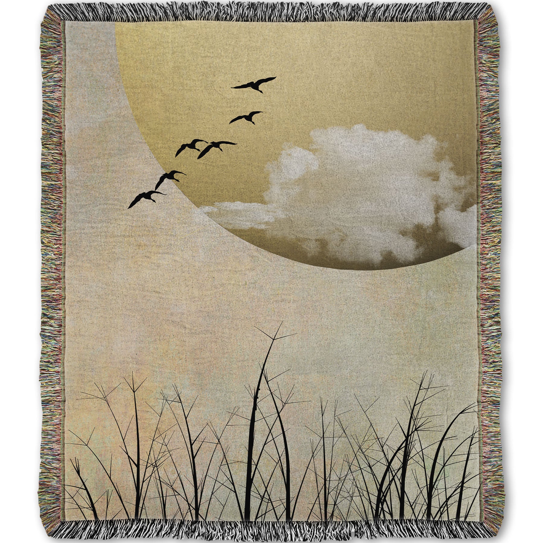 Woven throw blanket designed with a photo collage of migratory birds flying south for the winter, silhouetted against a big gold moon. 