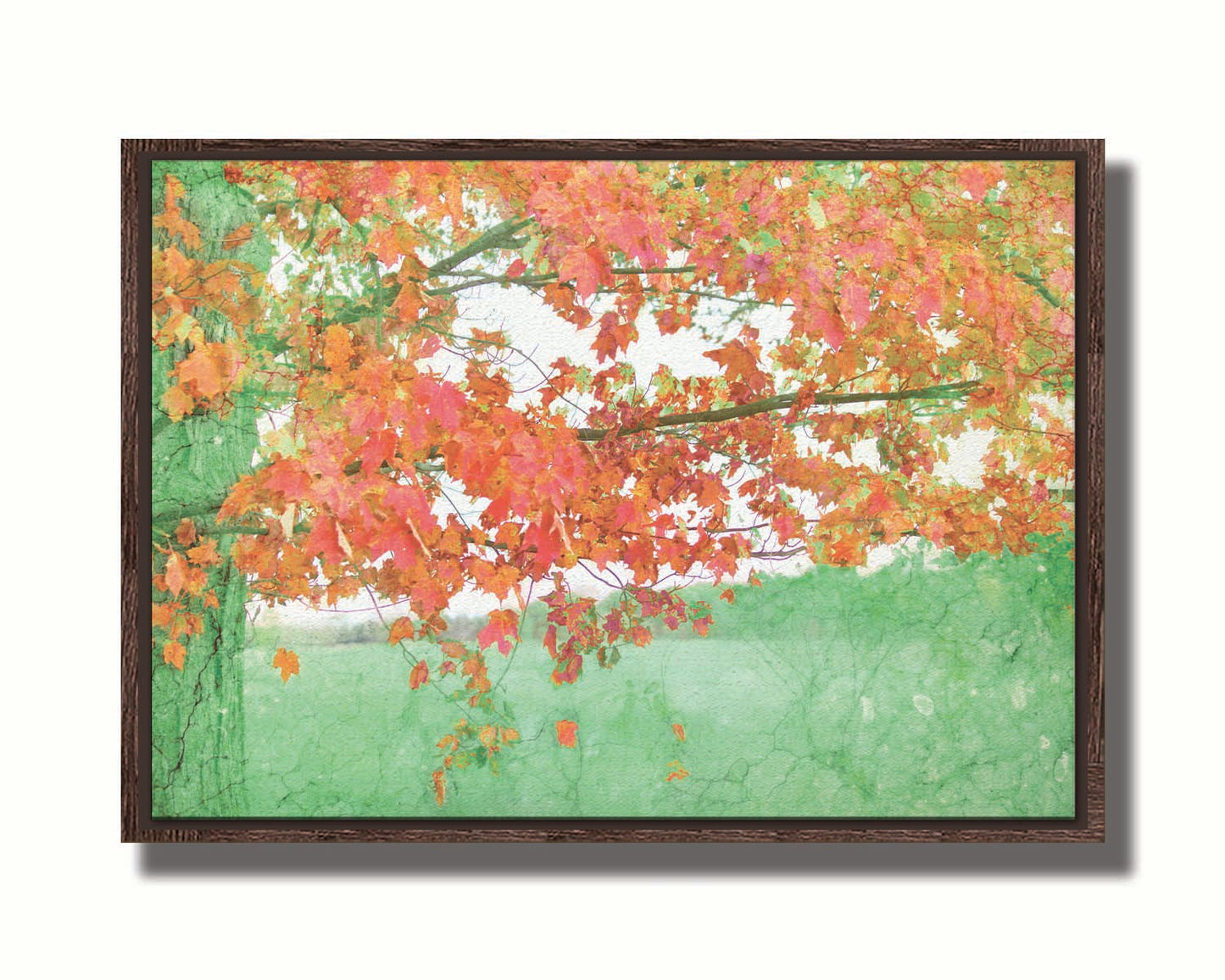 A photo of a tree's red leaves. The rest of the image has been edited green. Printed on canvas in a float frame.