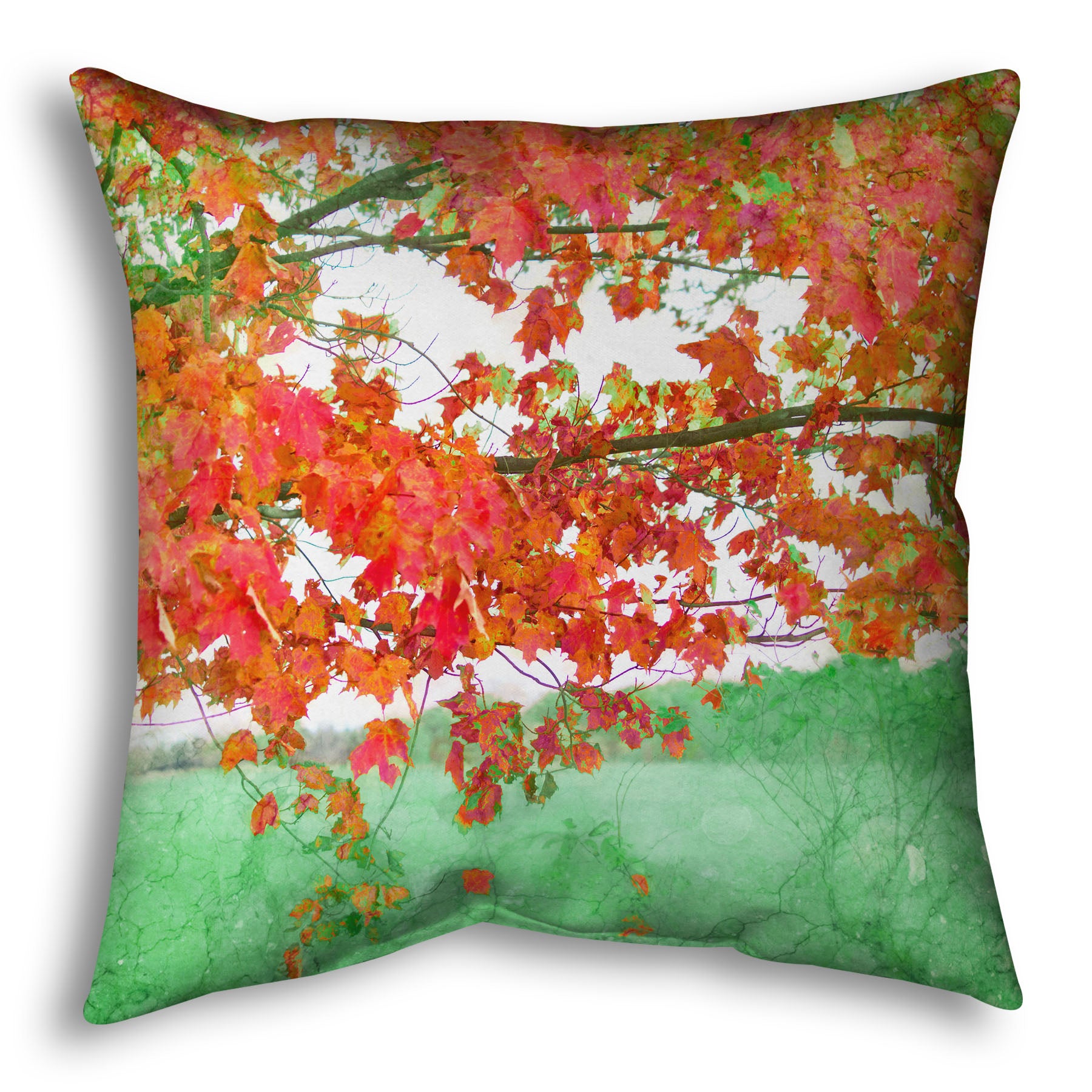 A throw pillow designed with a photo of a tree's red leaves. The rest of the image has been edited green.