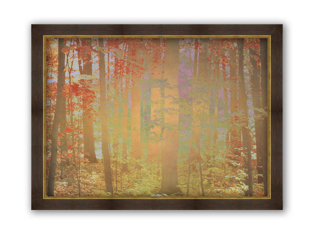 A photo of a forest with red leaves, edited with a color inverion radiating from the center. Printed on canvas and framed.